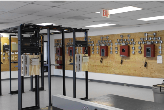 Telephone and Structured Cabling Systems in Foreground. Fire Alarm Systems in Background. Telephone and Structured Cabling Systems in Foreground. Fire Alarm Systems in Background.